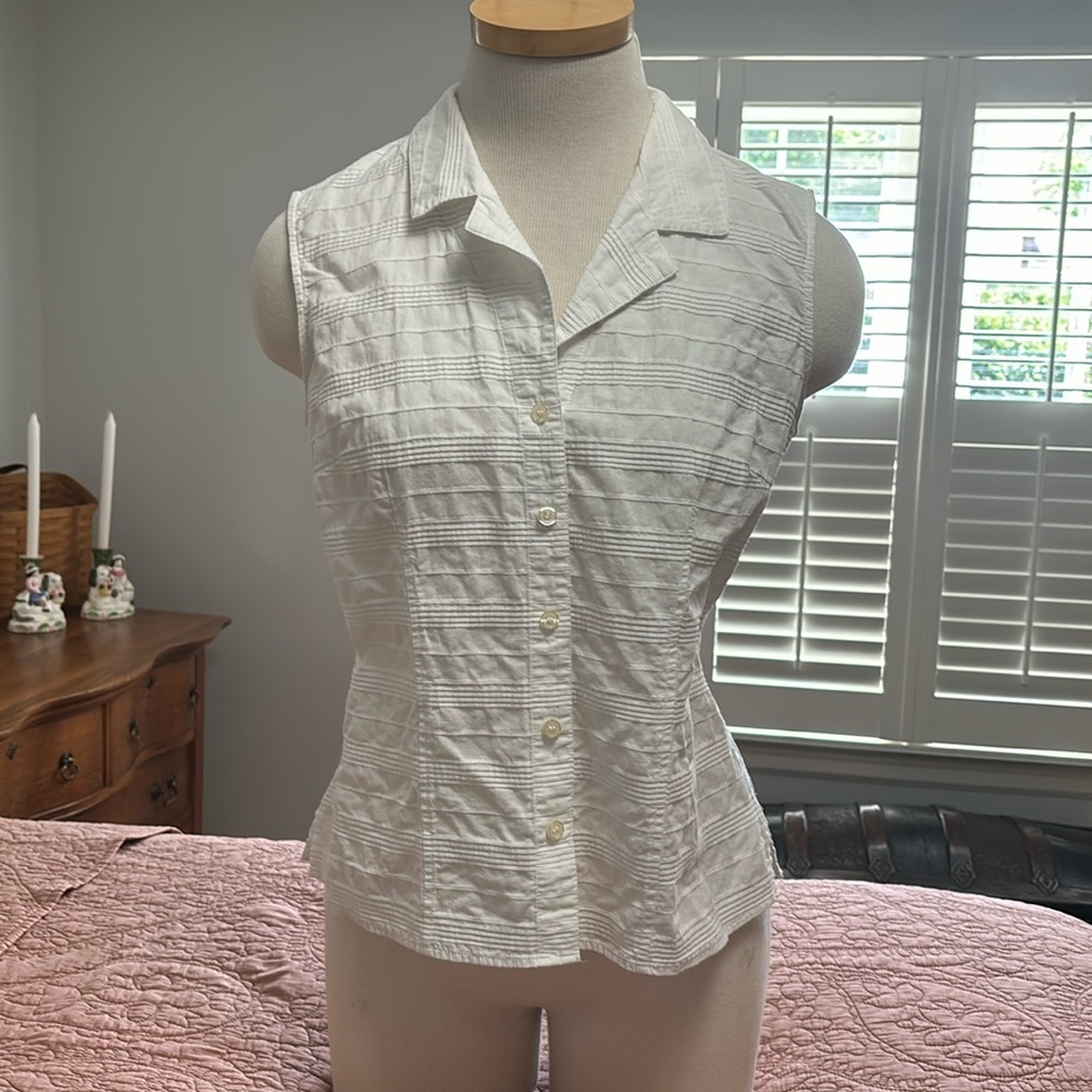 White, 100% cotton, sleeveless, button front blouse